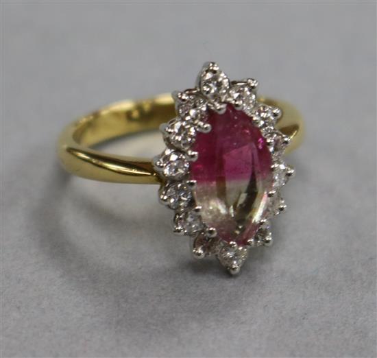 A modern 18ct gold marquise shaped watermelon tourmaline and diamond ring, size M.